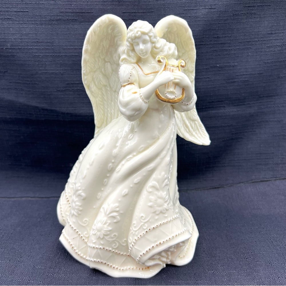 Palm Tree Angel Figurine  2000.  Ivory porcelain with Gold Harp and accents